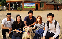 CUHK students pose for a group photo with a guide dog at the training base (Photo Credit: Mr. Leo Lee; Programme Host: South China Agricultural University)